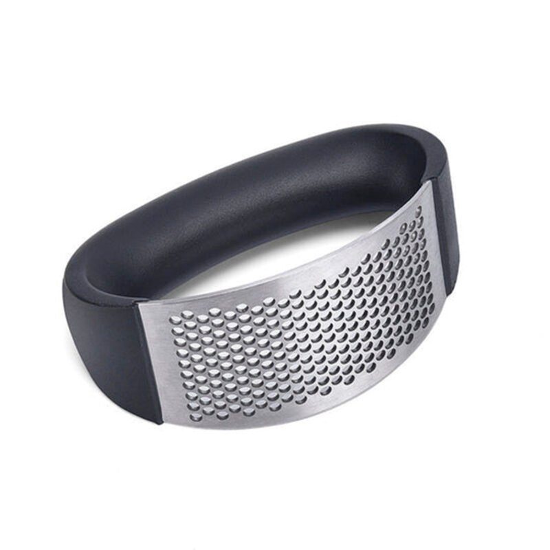 moledor de ajo doma y otros productos, acero inoxidable, diseÑo curvo y ergonomico.